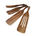 Set of engraved wooden spatulas on a white background