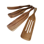 Set of engraved wooden spatulas on a white background
